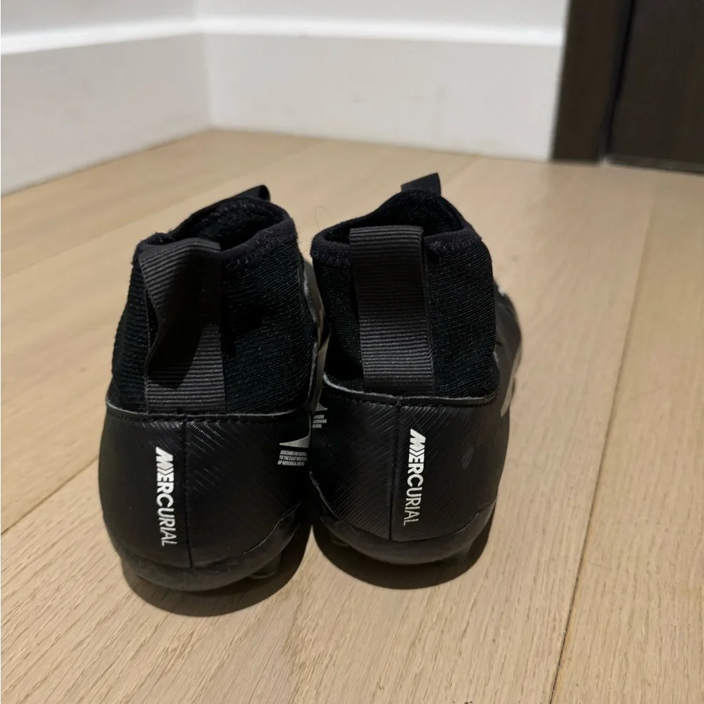 Nike Kids Black Soccer Cleats with Gray Swoosh